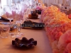 Wedding table with roses, orchids and hydrangea